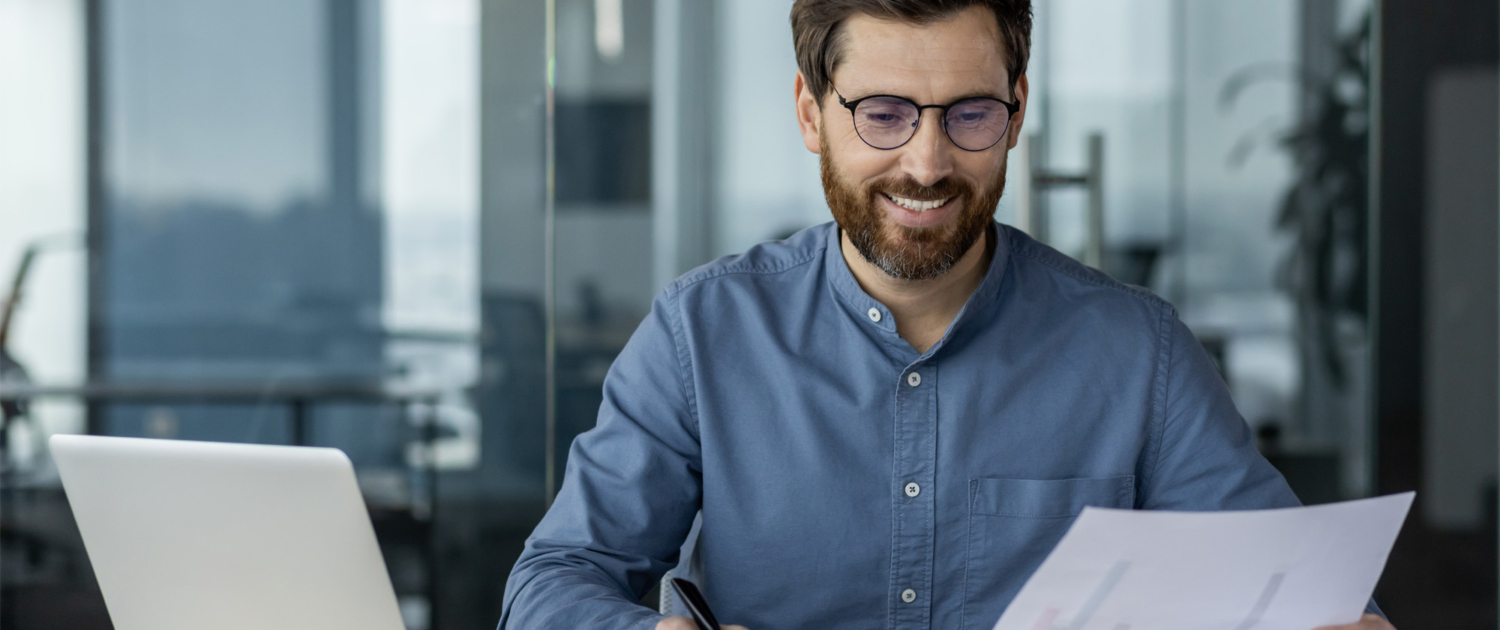 Accounting Worker On Laptop In Office